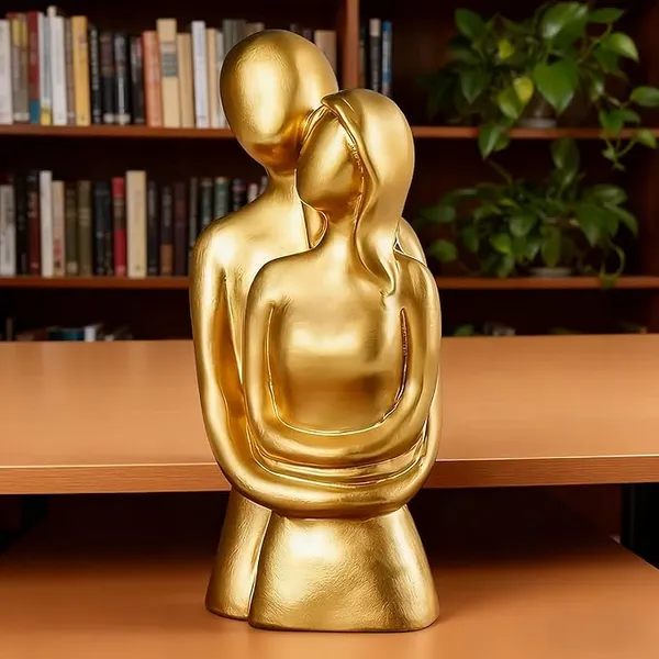 HASTHIP® Home Decor Romantic Desk Statue Golden Resin Hugging Couple Figure Statue Room Decoration Showpiece Wedding Present Anniversary Housewarming Gift, 1.96x4.21'' Rs.164 @ Amazon