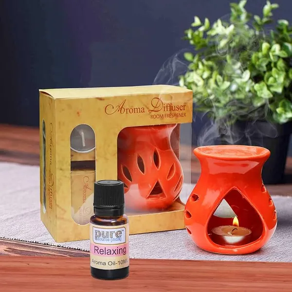 Pure Source India Ceramic Aroma Oil Diffuser Gift Set with 10ML Relaxing Oil & Tealight Candles | 97 Burner for Home Fragrance & Relaxation | Ideal for Gifting & Home Décor (Orange) Rs.173 @ Amazon